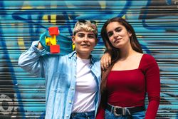 two women with a skate portrait