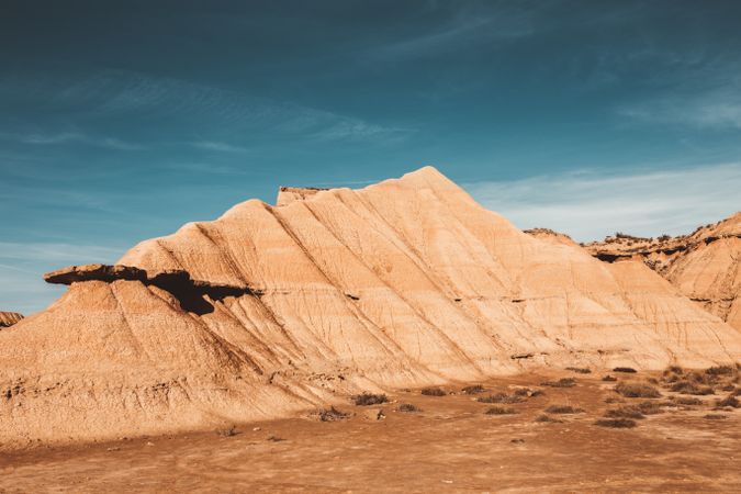 Desert cliffs under blue sky in landscape