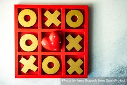 St. Valentine day card concept with heart in center of tic-tac-toe game 47mXLA