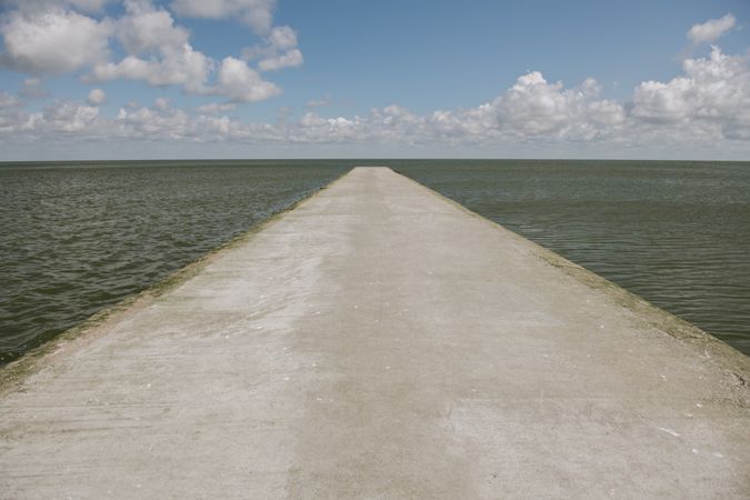 empty concrete quay on cloudy day