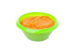 Bowl with healthy baby food isolated on plain background