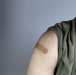 Band aid on arm