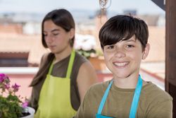 Portrait of a young teenagers gardening on patio