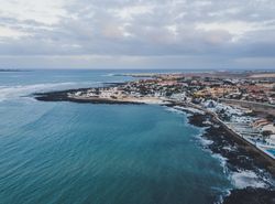 Scenic aerial view of city on ocean shore
