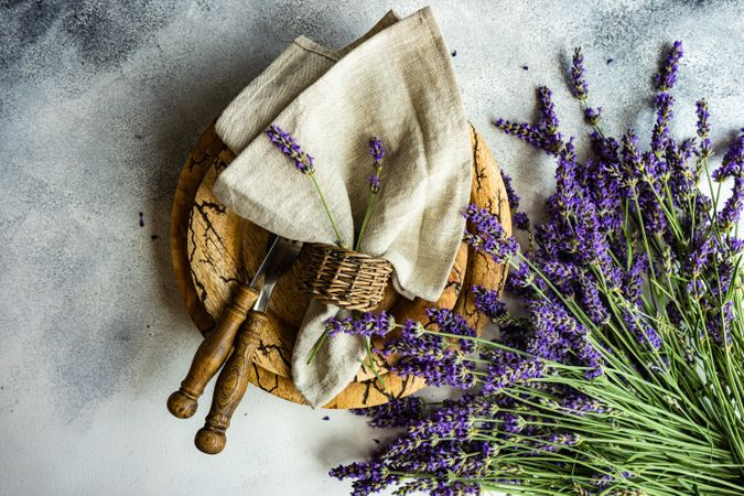Summer table setting with bunch of lavender flowers