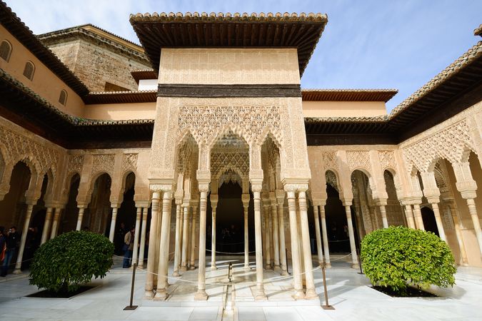 Striking courtyard of the Lions in the Alhambra