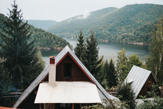 House near amazing lake near mountains