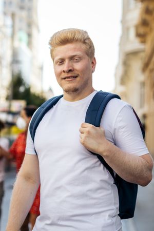 Portrait of a Latino man with albinism in the city