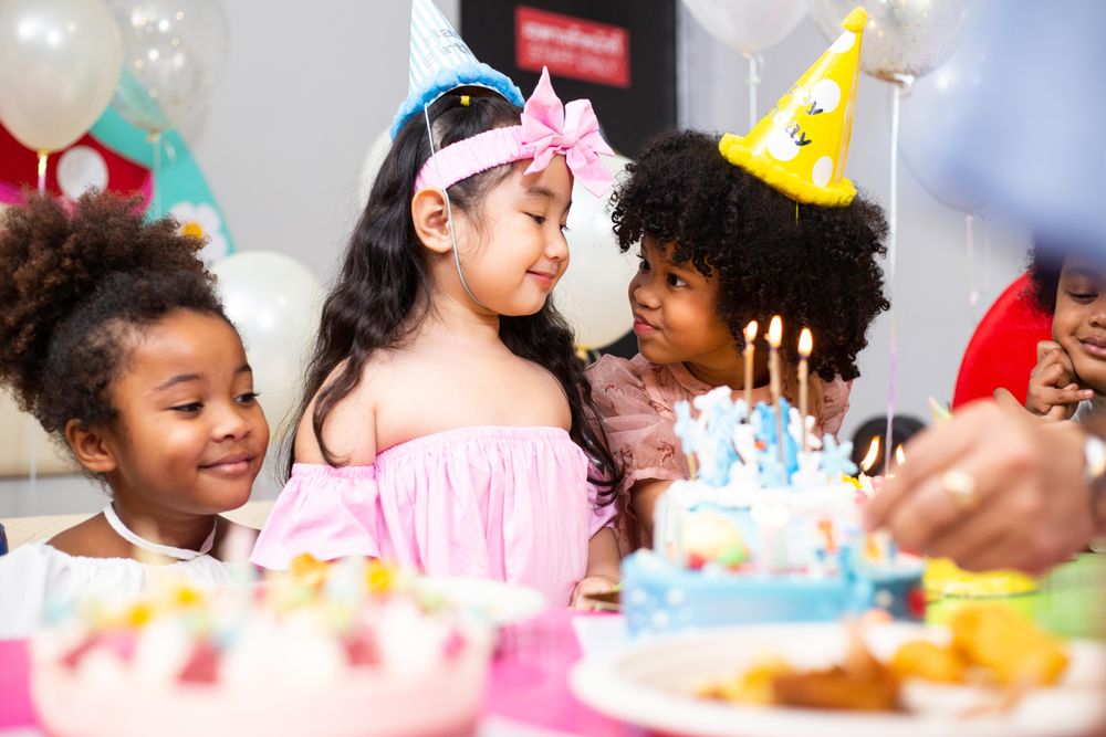Happy boys and girls at birthday party