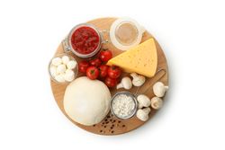 Dough and ingredients for cooking pizza isolated on blank background
