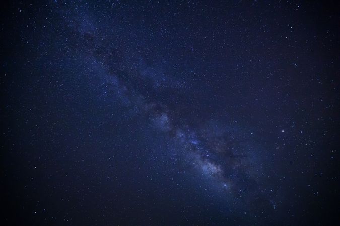milky way galaxy and space dust in the universe, Long exposure photograph, with grain.
