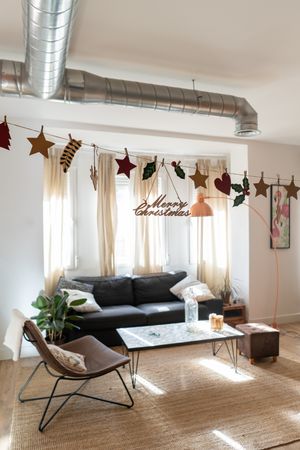 Light modern room decorated for Christmas