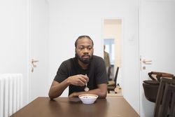 Domestic Scene: Man Eating Breakfast.