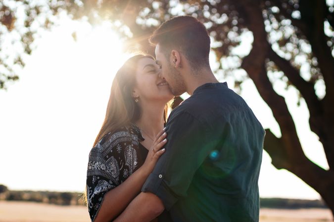 Lovely young couple in the countryside