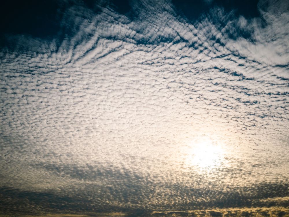 Picturesque cloudy sky at sundown