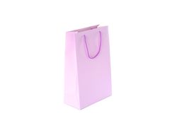 Purple paper bag isolated on blank background