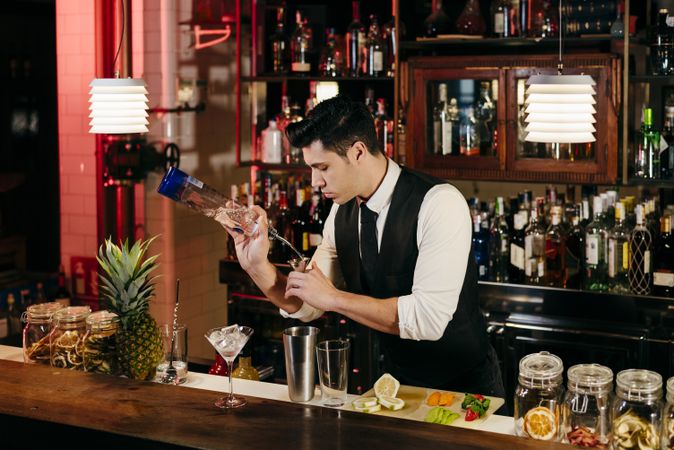 Barman working making drinks