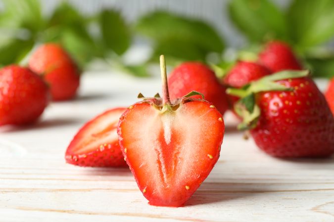 Tasty strawberry on wooden background. Summer berry