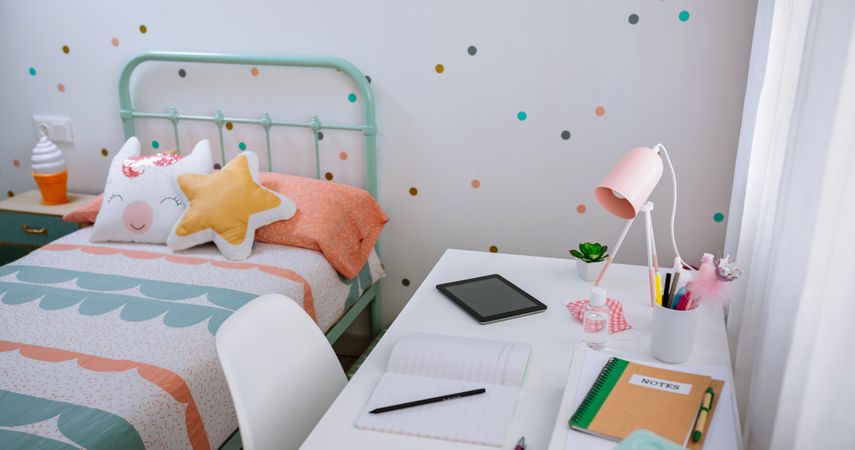 Girl's bedroom decorated in pastel colors