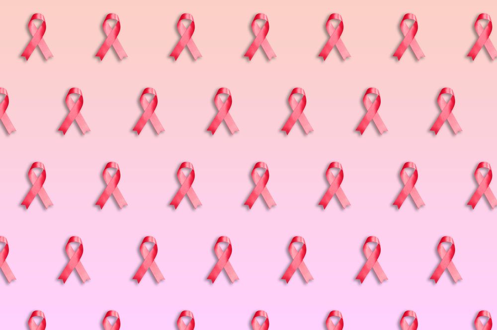 Rows on pink ribbons on pink background