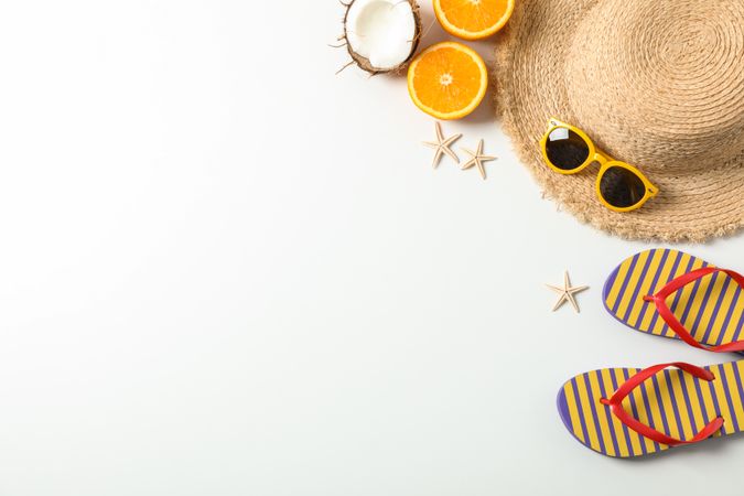 Flat lay composition with summer vacation accessories on blank background,top view and space for text. Happy holidays