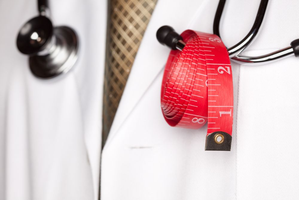 Doctor with Stethoscope and Measuring Tape