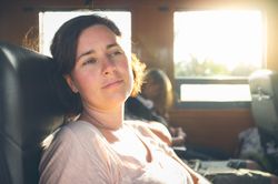 Young woman traveling in car