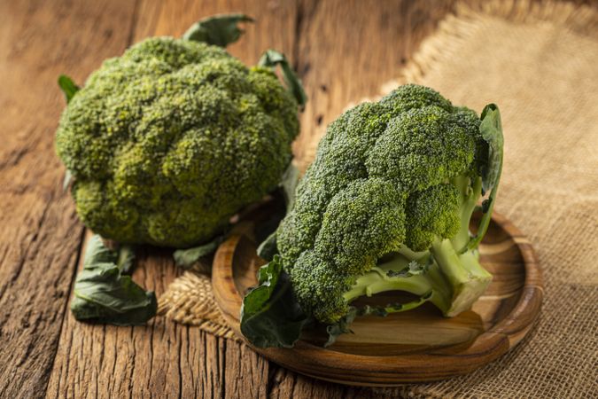 Green organic broccoli on the table.