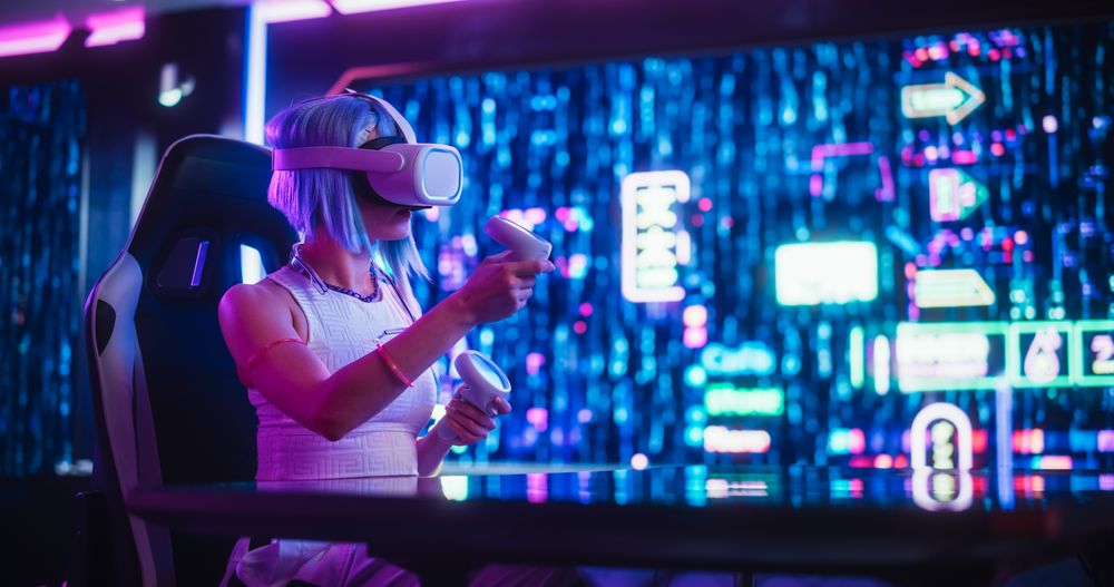 Young Cosplay Female Exploring VR Metaverse Online While Sitting Behind a Desk