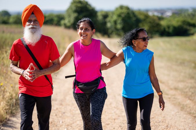Older Sikh family walking