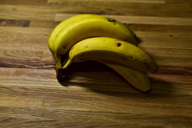 Yellow banana on a wooden table.