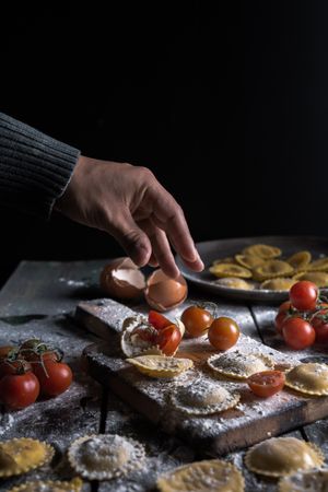 Homemade ravioli made with parmesan cheese, tomato and basil.