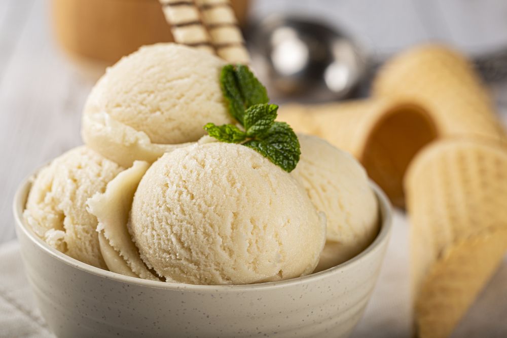 Bowl with vanilla ice cream balls.