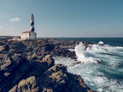 Picturesque scenery of lighthouse located on seashore
