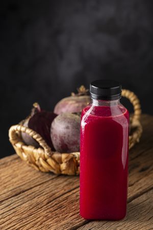 Red beet juice in plastic bottle.