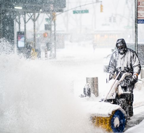 Man using snowplow