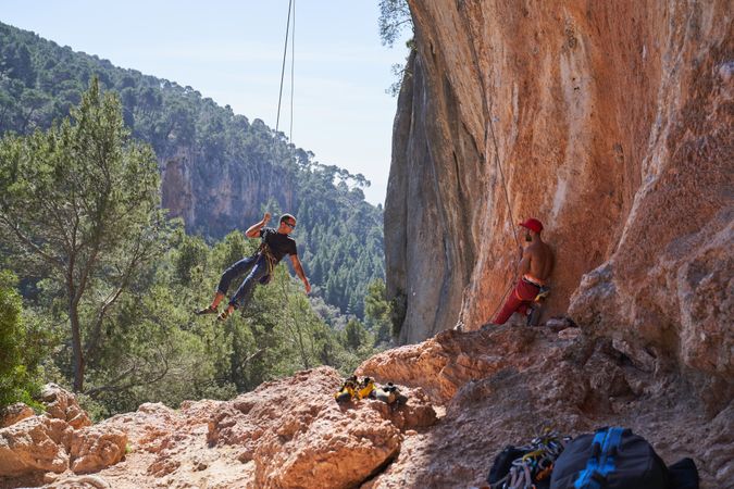 Alpinists training near rocky mountain