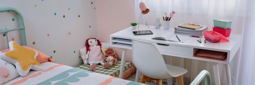 Girl's bedroom decorated in pastel colors