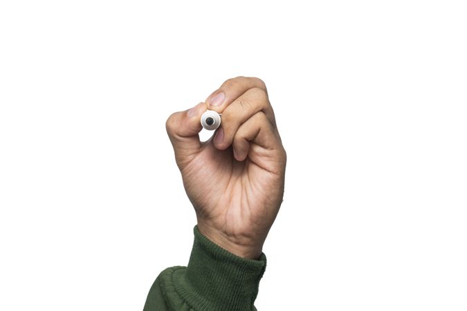male hand holding whiteboard marker