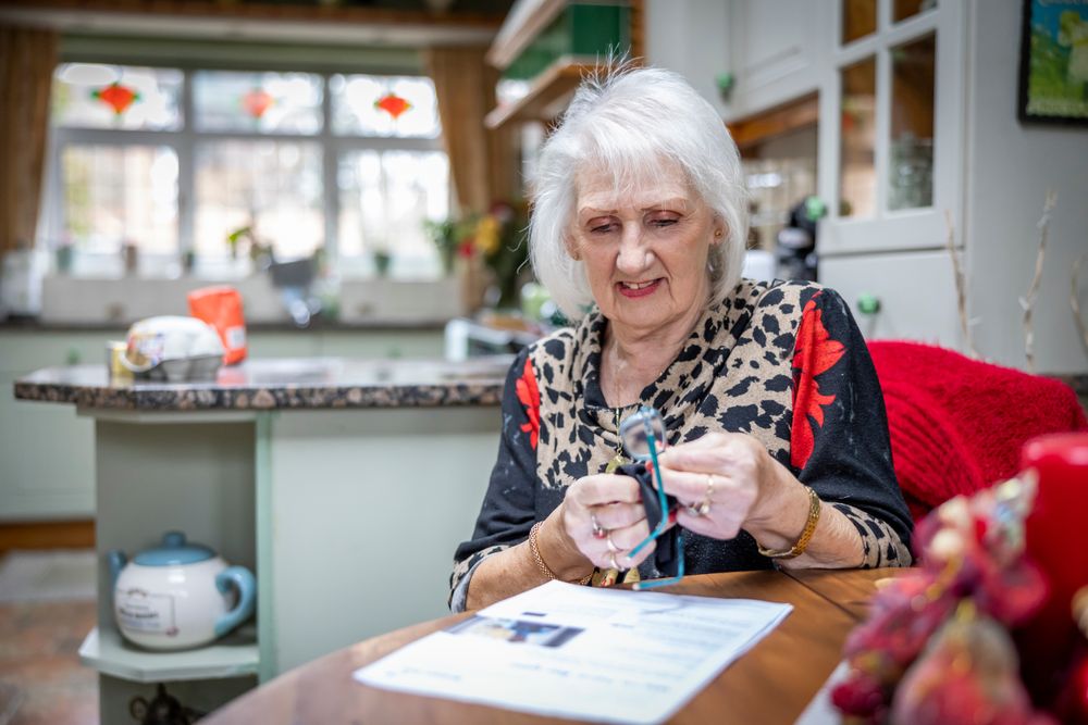 Woman at kitchen table