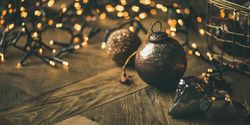 Christmas tree decorations, on wooden counter, close up, copy space, wide composition