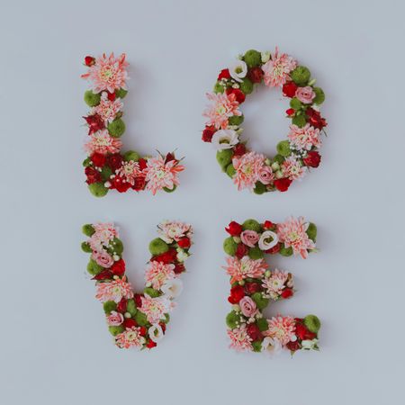 Word “LOVE” made of various flower