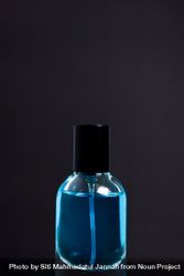 Light blue perfume bottle in studio with copy space 41lpX7