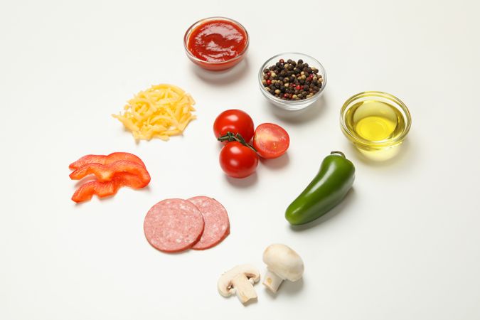 Ingredients for cooking pizza on blank background
