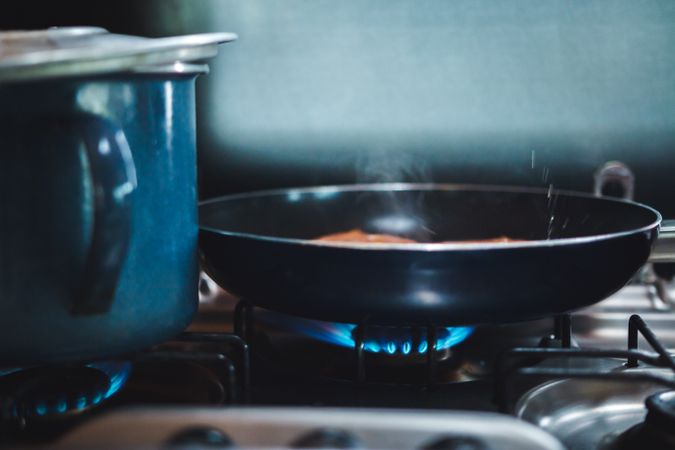 Kitchenware heating on gas stove