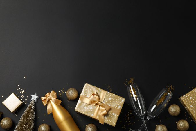 Composition with presents and christmas accessories on dark background, copy space