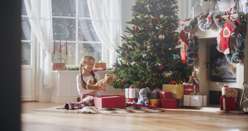 Cute Child Getting Her Gift from Santa