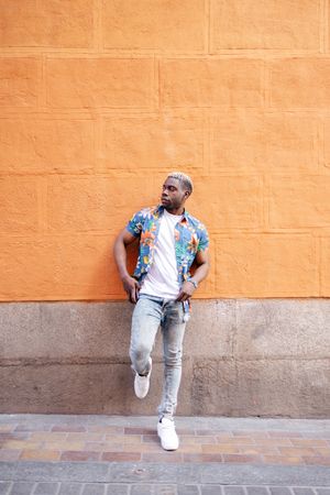 Portrait of a young Black man in the street