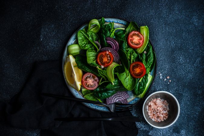 Top view of spinach salad with sesame seeds