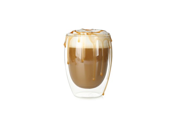 Glass of latte isolated on blank background